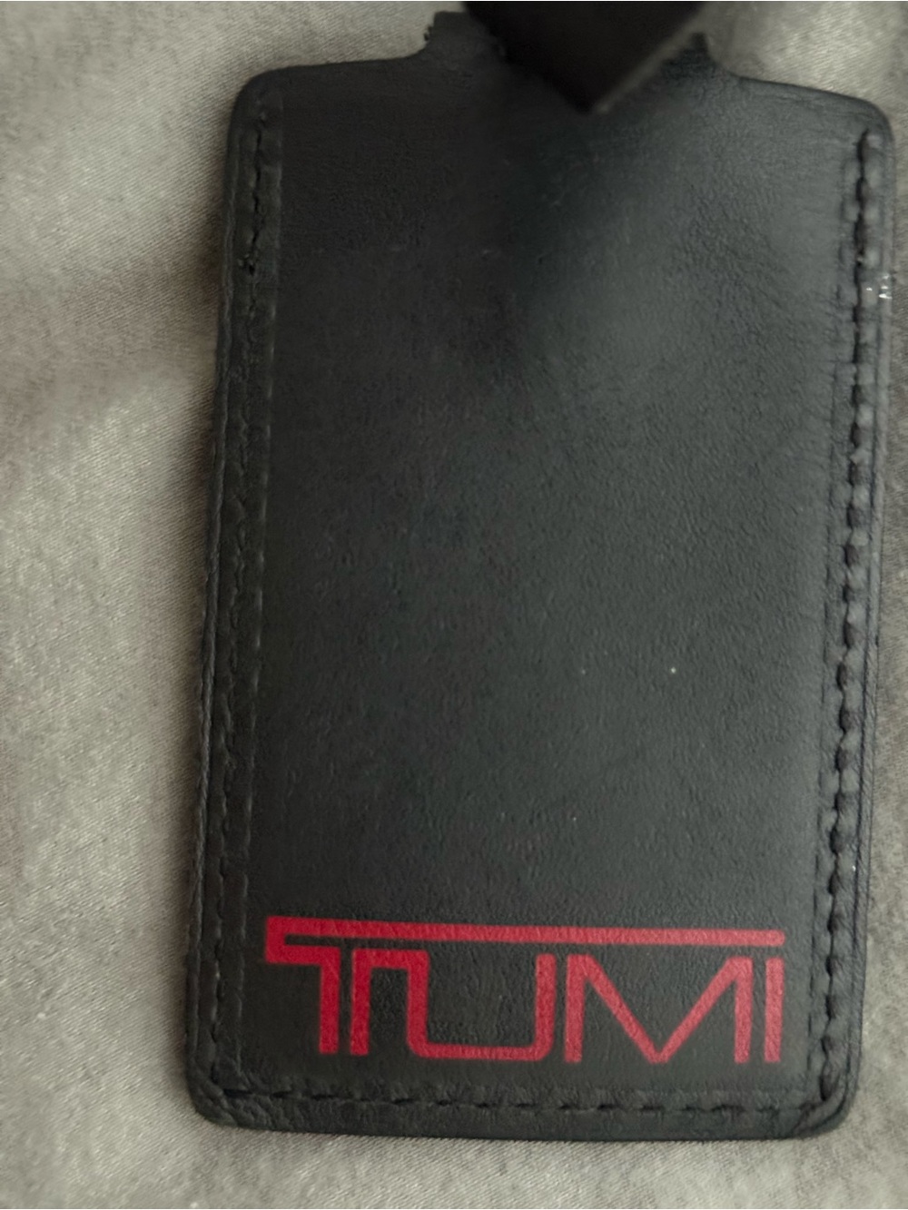 Tumi Black Leather Luggage Tag with Red Logo and Initials